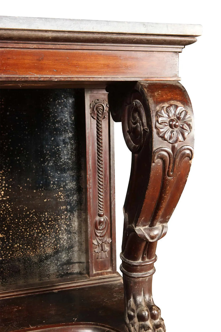 Pair of Palatial Early 19th Century Franco Indian Console Tables with ornate carved wooden details and marble top.