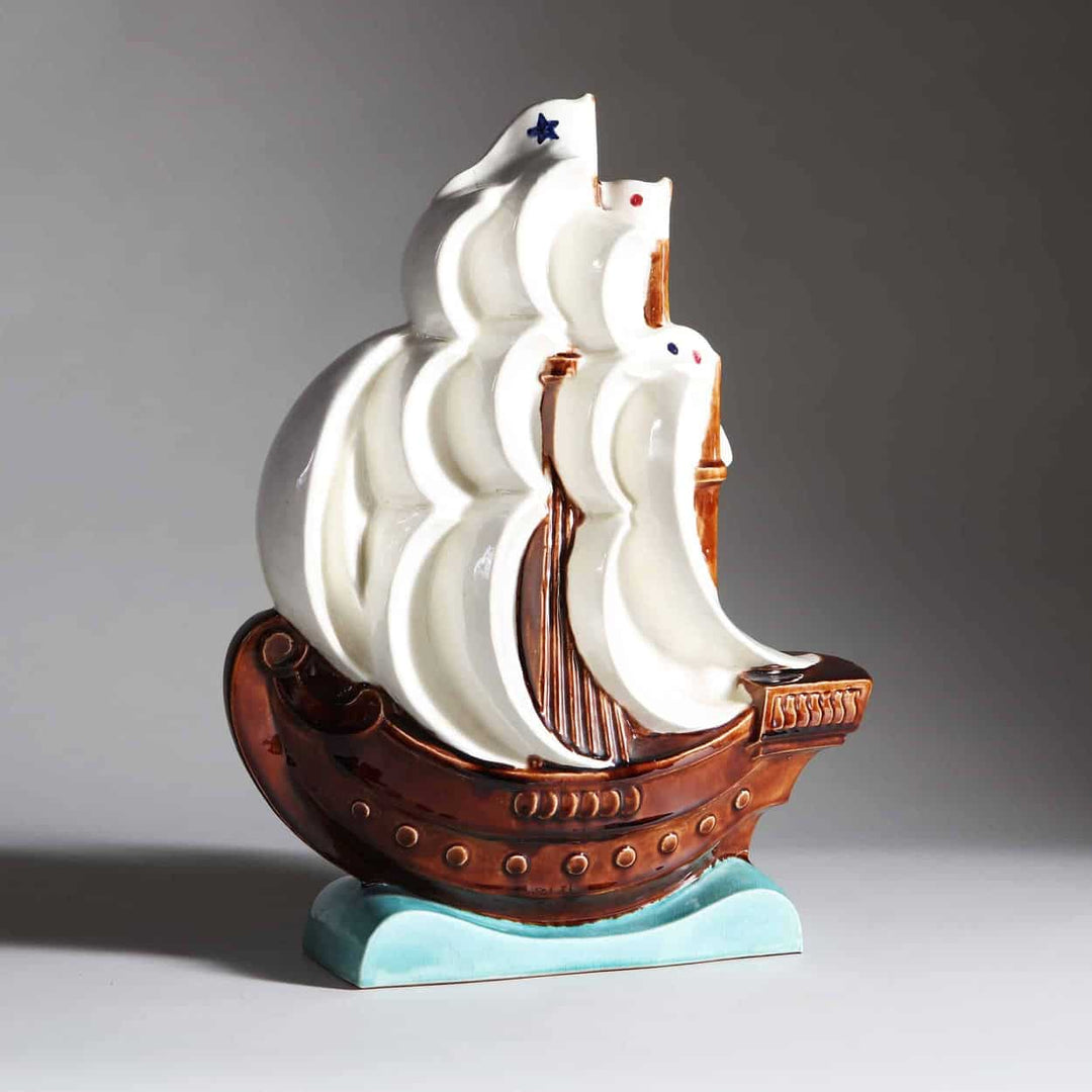 An Art Deco pottery sculpture of a ship in sail