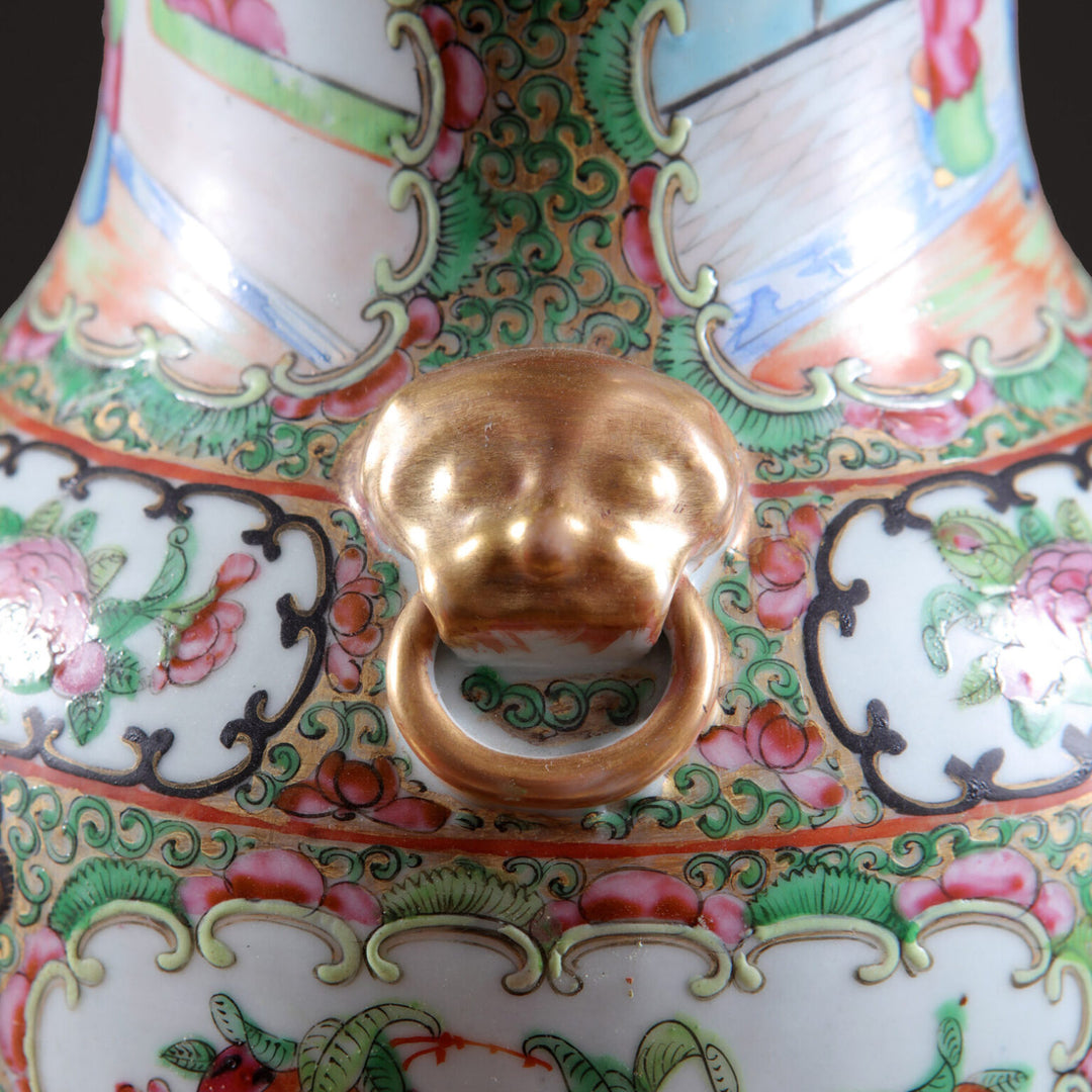 Pair of Canton Porcelain Vases Mounted as Table Lamps showing close-up detail of ornate handle and floral patterns.