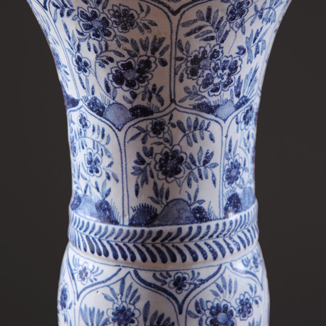 Delft Blue and White Kangxi Table Lamps close-up showing intricate blue floral design on white vase body.