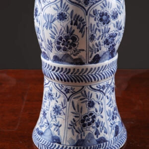 Delft Blue and White Kangxi Table Lamps with floral patterns on blue and white vase bodies, circa 1850, 33 cm tall.