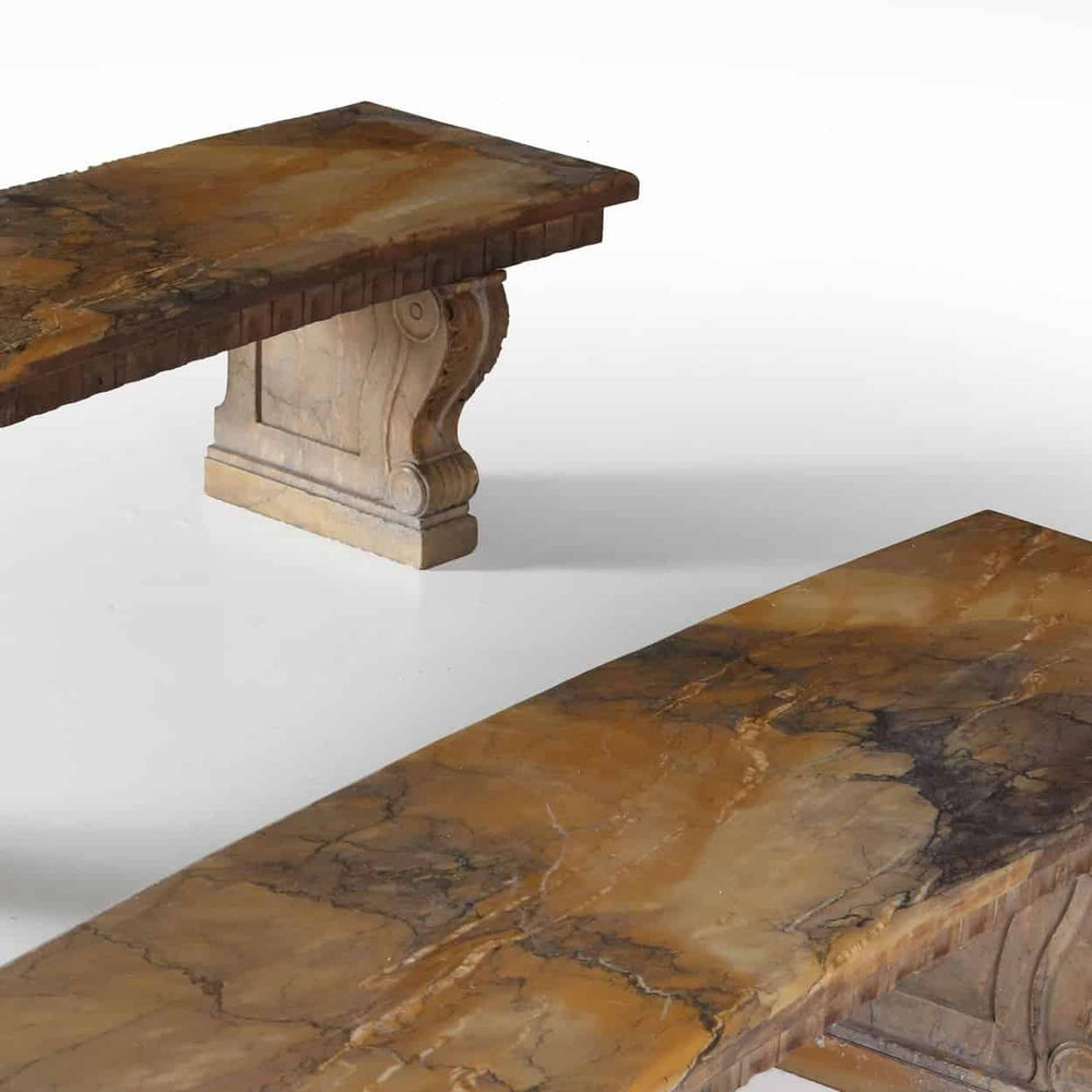 Pair of Curved Solid Siena Marble Benches with rich brown veining and sculpted cream stone supports circa 1900 Italy.