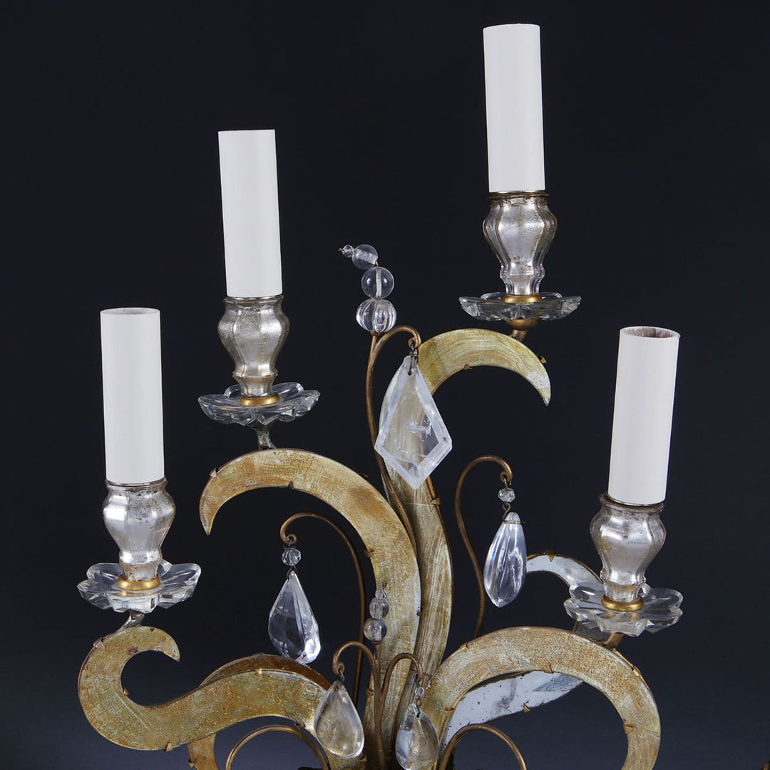 Pair of Maison Bagues Four Light Flame Candelabra with gilt flames, eglomise glass panels, and rock crystal drops.