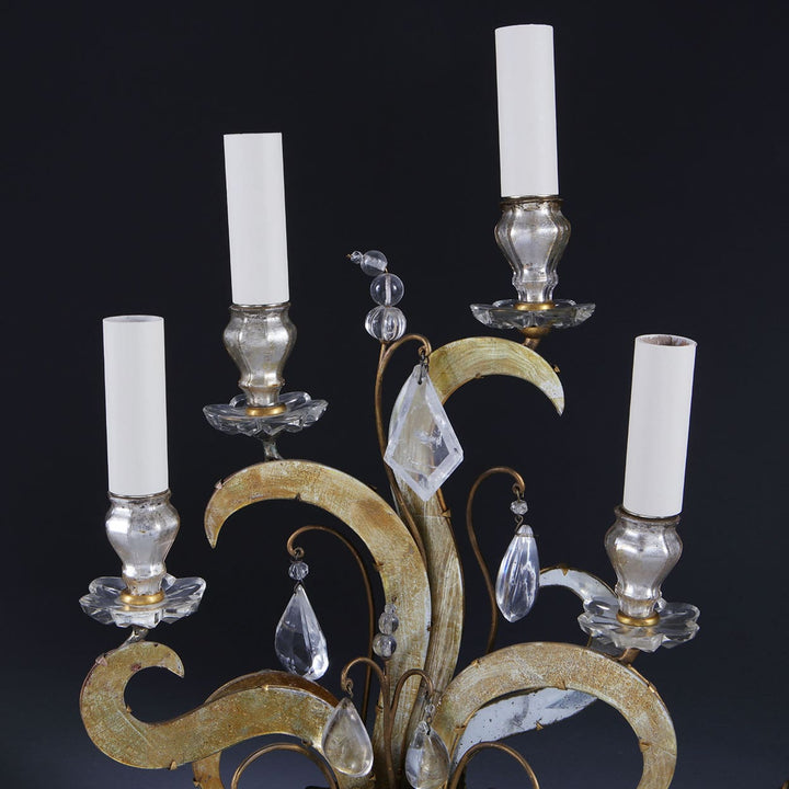 Pair of Maison Bagues Four Light Flame Candelabra with gilt flames, eglomise glass panels, and rock crystal drops.