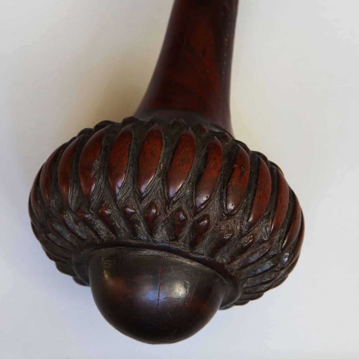 Close-up of the carved handle design on a Fijian I Ula Tavatava Throwing Club wooden weapon