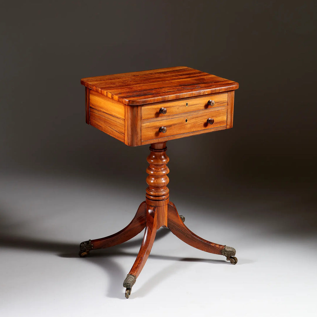 Regency Goncalo Alves Occasional Table England circa 1810 wooden antique table with drawers and brass casters