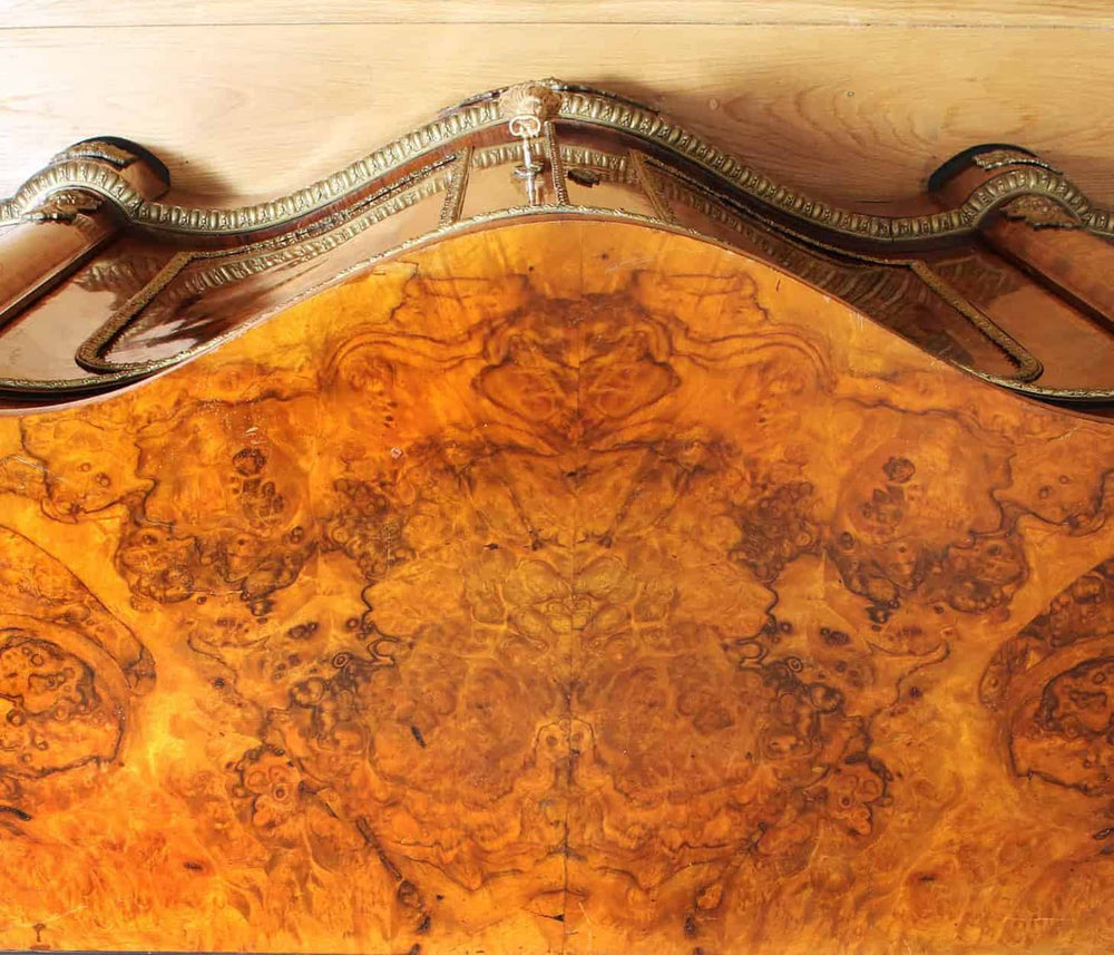 Close-up of intricate walnut marquetry and ornate ormolu mounts on antique credenza by Nicholas Wells Antiques