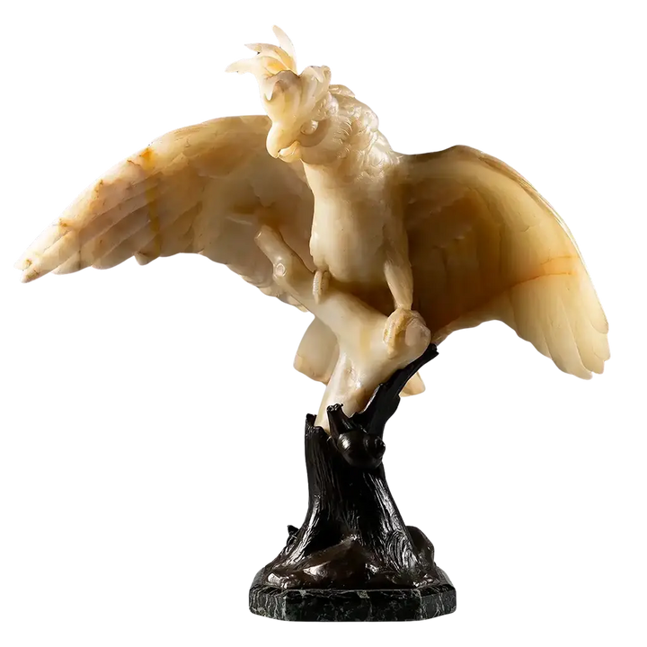 Finely Carved Alabaster Cockatoo Sculpture perched on a bronze tree trunk with detailed feathers and elegant pose