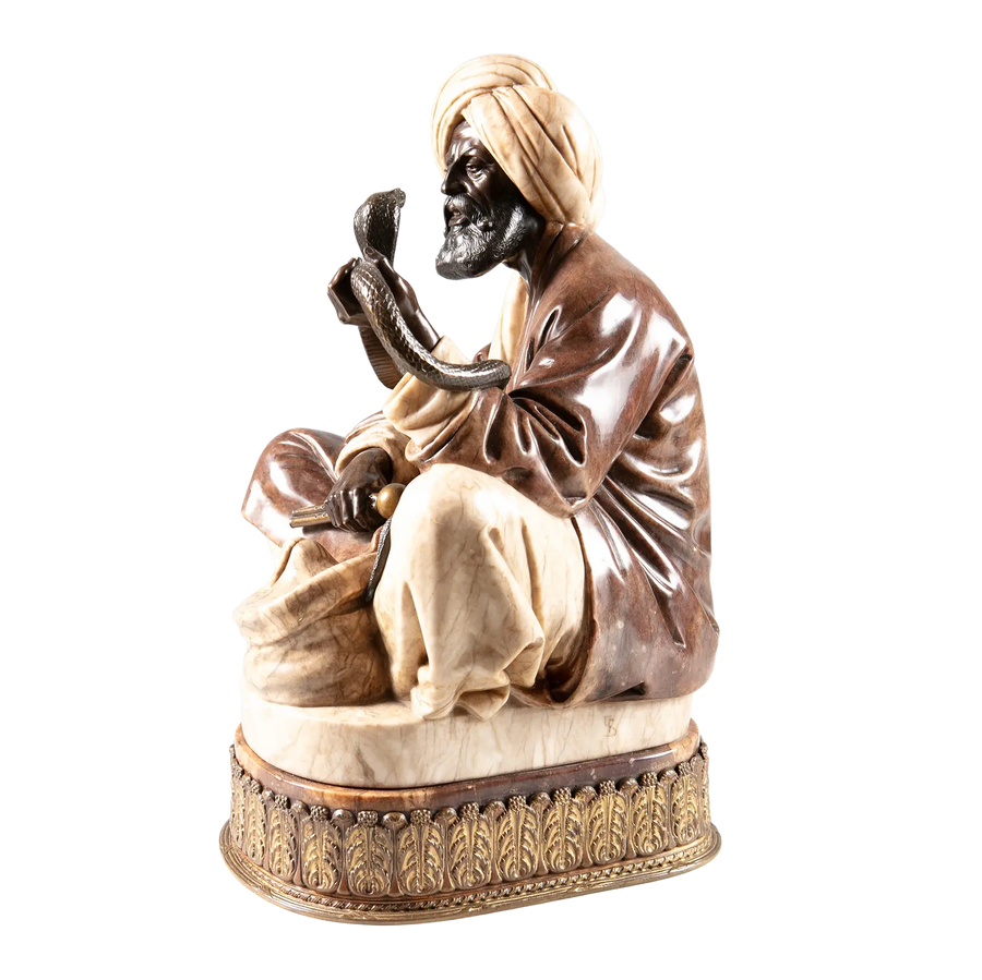 Rudolf Franke-Nautschรผtz snake charmer sculpture in two-tone onyx and alabaster, gilt bronze base from Nicholas Wells Antiques