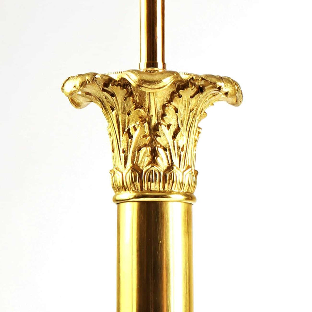 Pair of French Carcel Polished Bronze Table Lamps Corinthian fluted column with acanthus and lion mask details circa 1840.