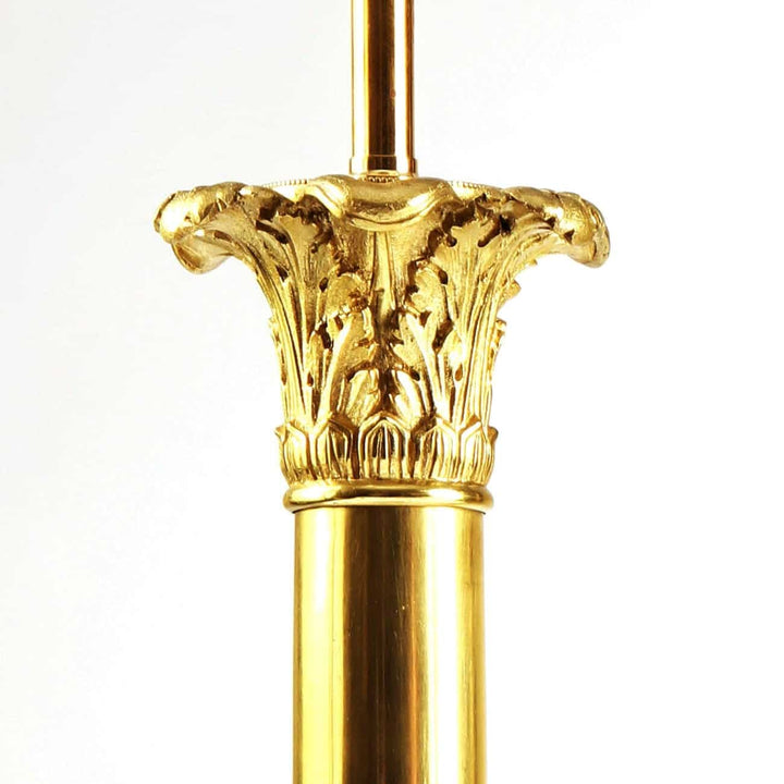 Pair of French Carcel Polished Bronze Table Lamps Corinthian fluted column with acanthus and lion mask details circa 1840.