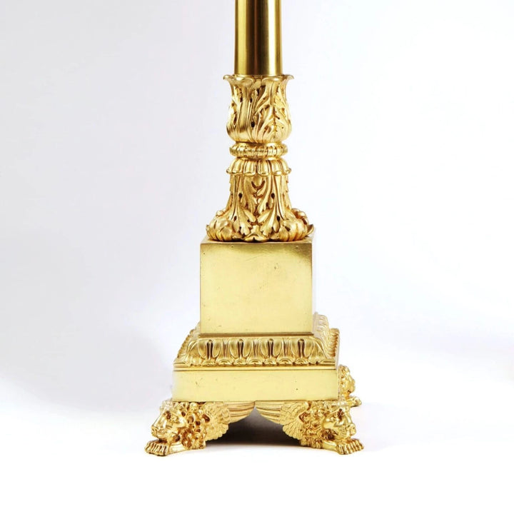 Pair of French Carcel Polished Bronze Table Lamps with lion paw feet and Corinthian fluted columns, circa 1840.