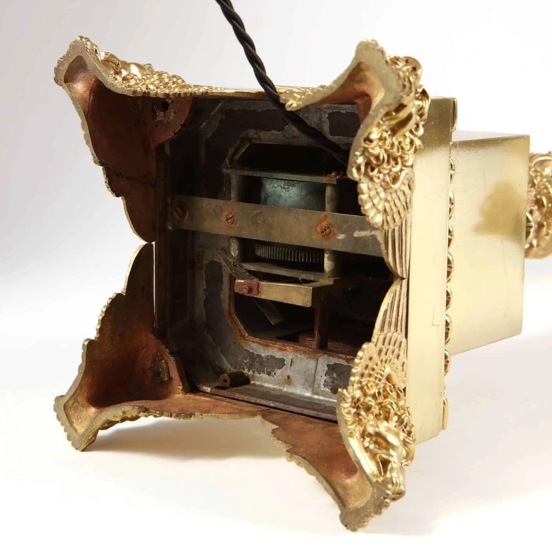 Pair of French Carcel Polished Bronze Table Lamps showing detailed bronze base with lion mask paw feet and internal oil pump mechanism.