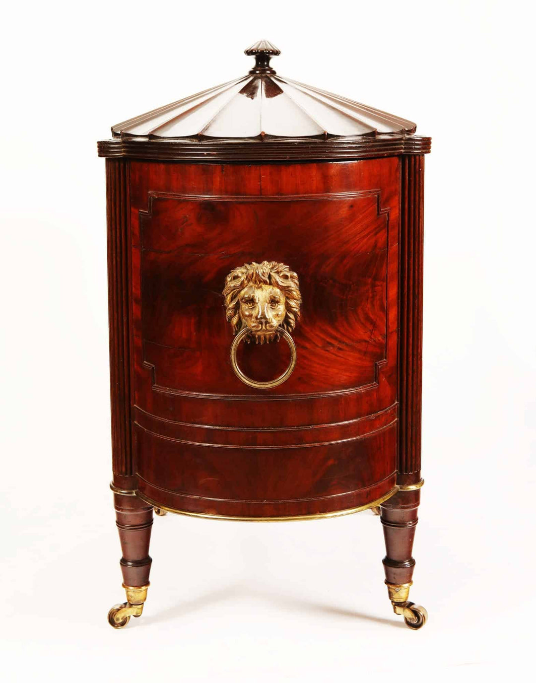 George III Cellarette Attributed To Gillows mahogany with lion head brass handles and tapered fluted legs on casters.
