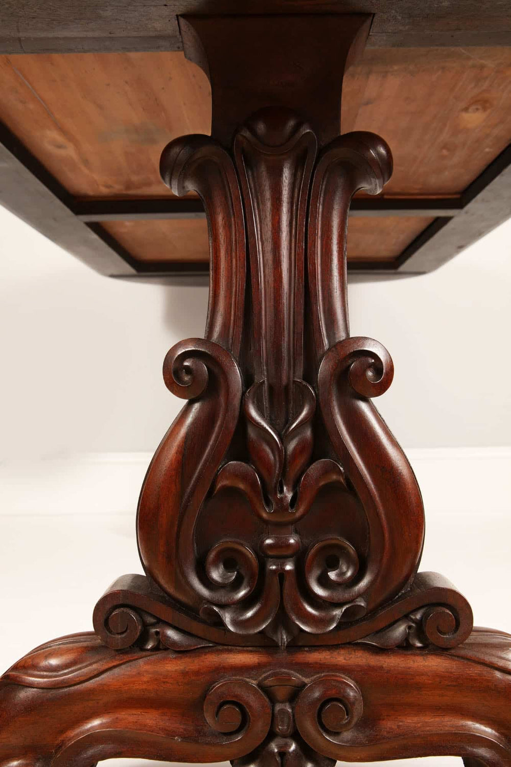 William IV Irish Rosewood Library Table By Williams & Gibton detailed carved rosewood leg close-up view.