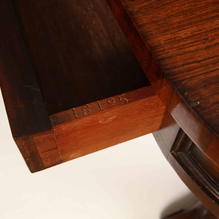 Close-up of open drawer with numbers carved on the William IV Irish Rosewood Library Table By Williams & Gibton.