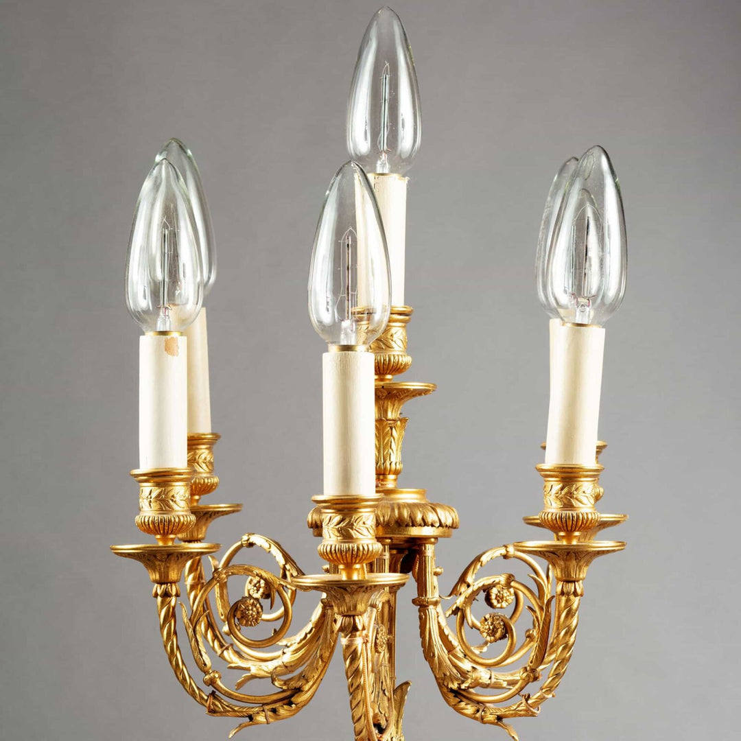 Gilt Bronze and Rosso Francia Marble Candelabra with six lights on ornate gilt-bronze arms, 19th-century French design.