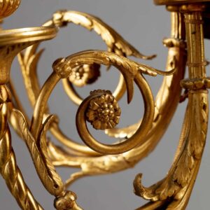 Gilt Bronze and Rosso Francia Marble Candelabra with six lights and ornate gilt-bronze arms, 19th-century French design.