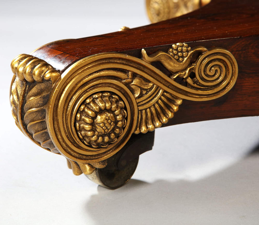 Regency Rosewood Square Center Table detailed gilt metal ornament and cast bronze feet on splayed legs close-up.