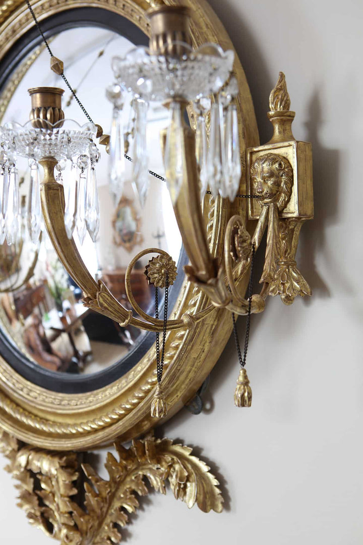 Irish Regency Convex Mirror Signed Arthur Williams with giltwood frame, etched details, and crystal candleholders.