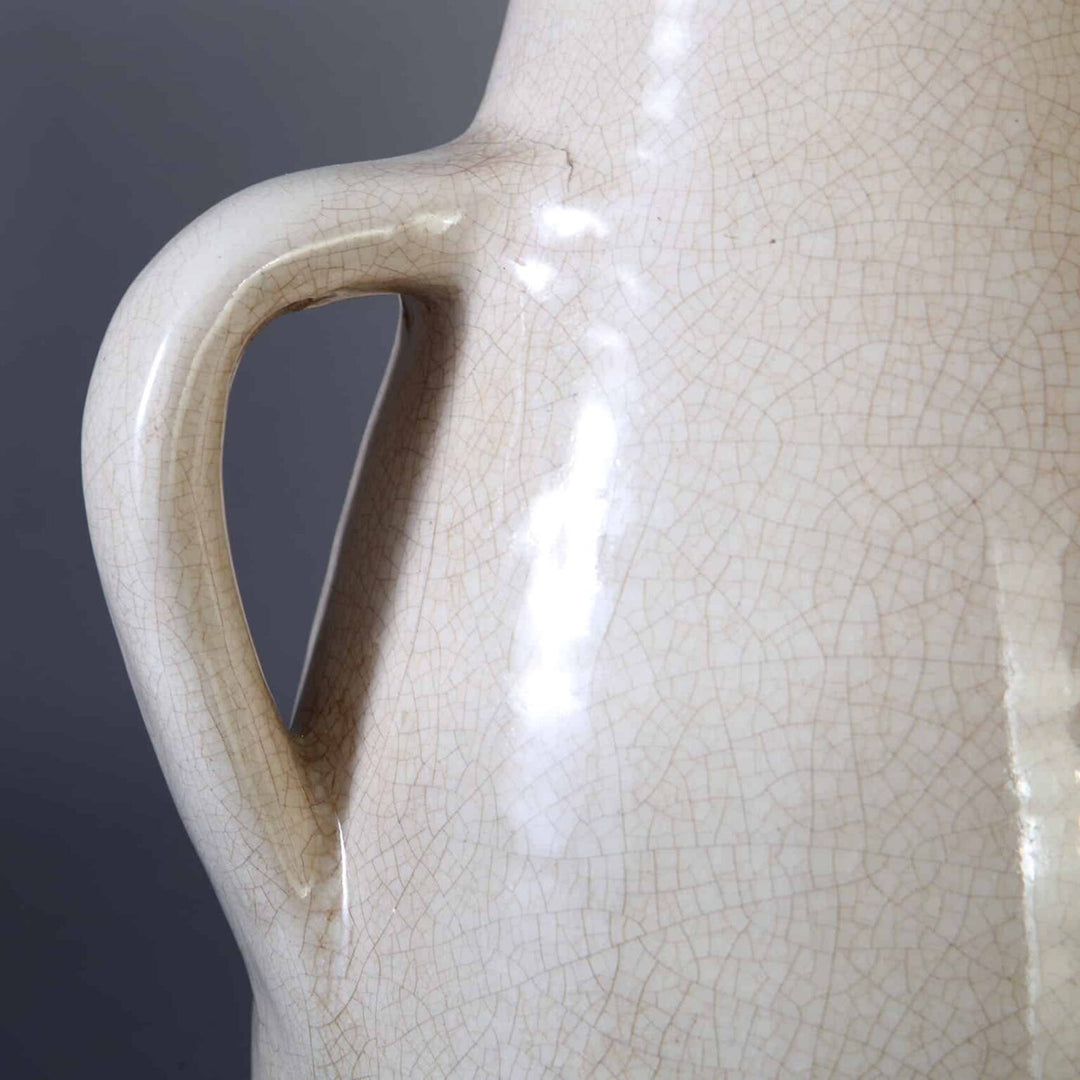 Vase attributed to Jean Besnard Mounted as a Table Lamp in off white crackle glaze with handle detail.
