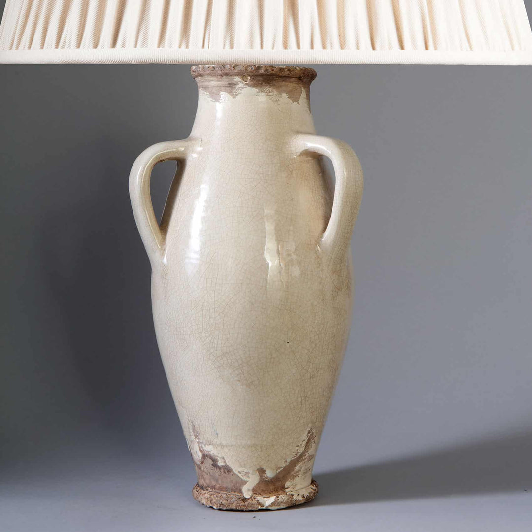 Vase attributed to Jean Besnard Mounted as a Table Lamp with off white crackle glaze and two handles.