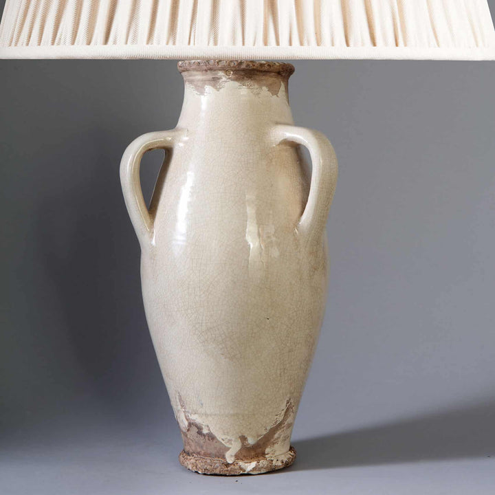 Vase attributed to Jean Besnard Mounted as a Table Lamp with off white crackle glaze and two handles.