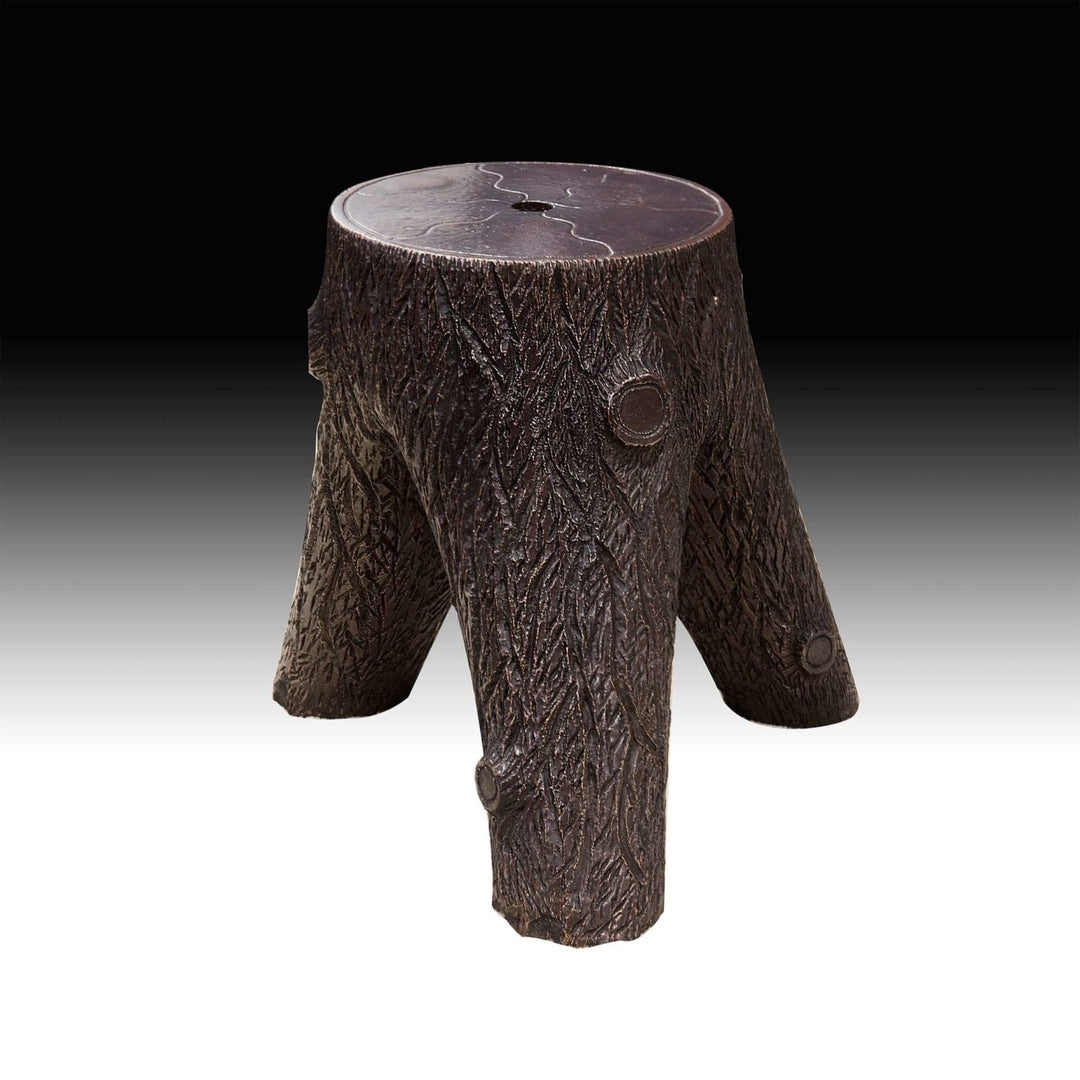 A tree stump stoneware stool