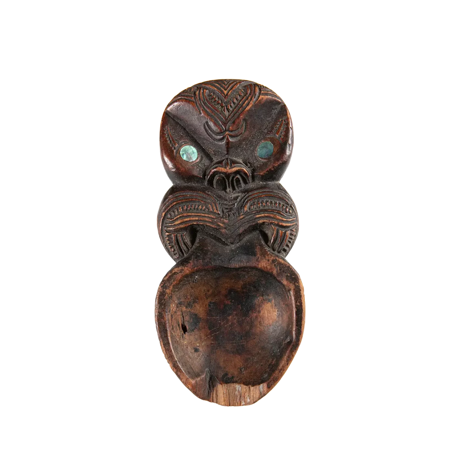 Maori Moka Tattoo Ink Holder carved wooden tray with intricate patterns and pāua shell insets from 19th century New Zealand.