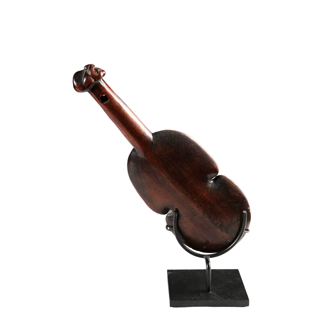 Maori Kotiate Hand Club, New Zealand, 18th century Vesi wood traditional Māori weapon on display stand.