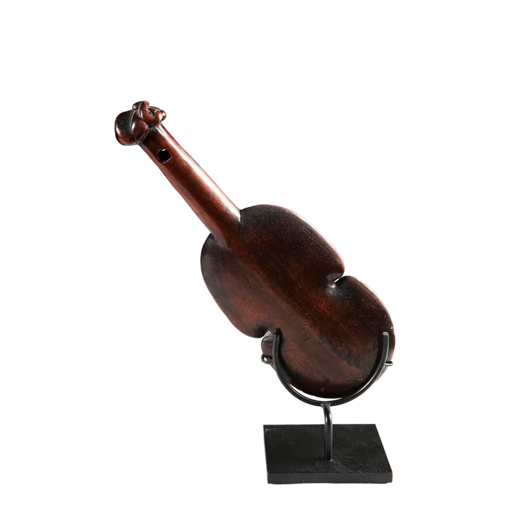 Maori Kotiate Hand Club, New Zealand, 18th century Vesi wood traditional Māori weapon on display stand.