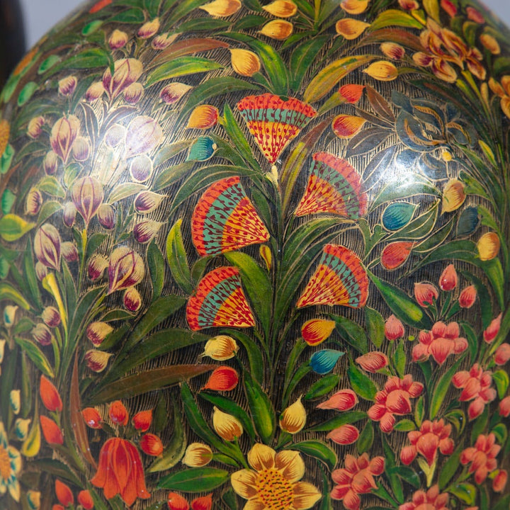 Pair of polychrome Kashmiri lacquer vases mounted as lamps with intricate colorful foliate patterns circa 1900.