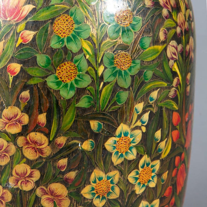 Pair of polychrome Kashmiri lacquer vases mounted as lamps with intricate foliate detail and vibrant floral patterns.