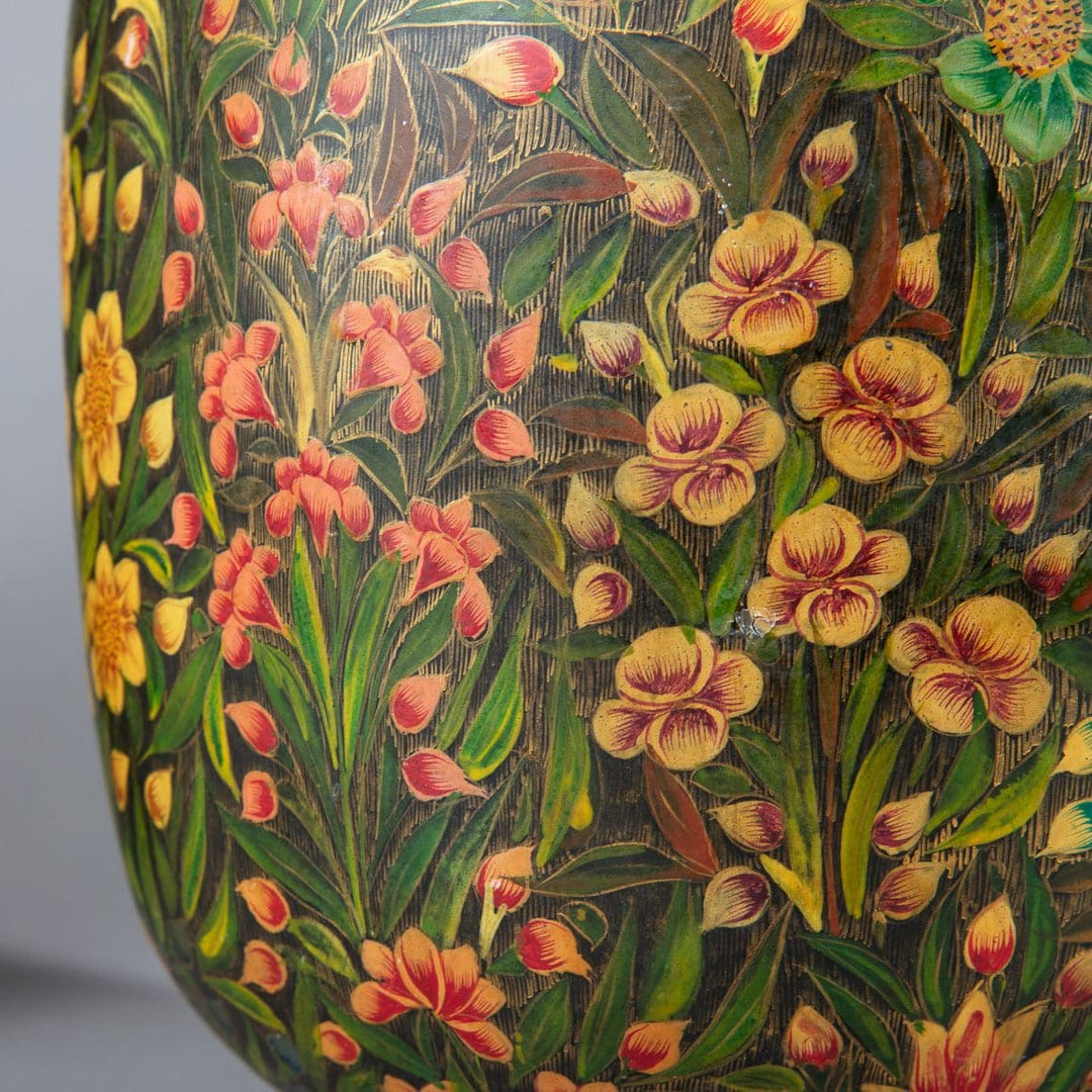 Pair of polychrome Kashmiri lacquer vases mounted as lamps with detailed foliate floral patterns in vibrant colors.