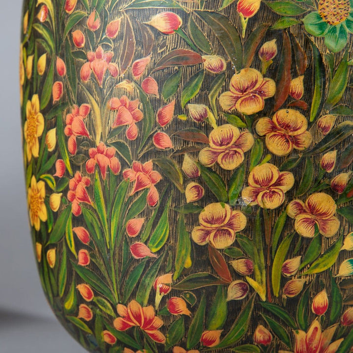 Pair of polychrome Kashmiri lacquer vases mounted as lamps with detailed foliate floral patterns in vibrant colors.