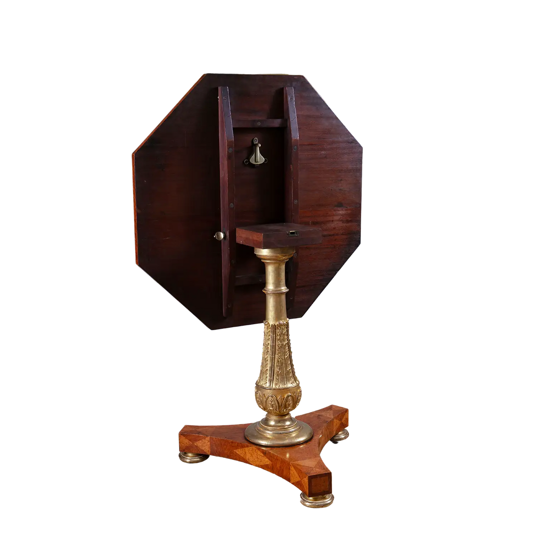 Marquetry Occasional Table by Jamar with octagonal parquetry top, gilt stem, and triform base, circa 1820.