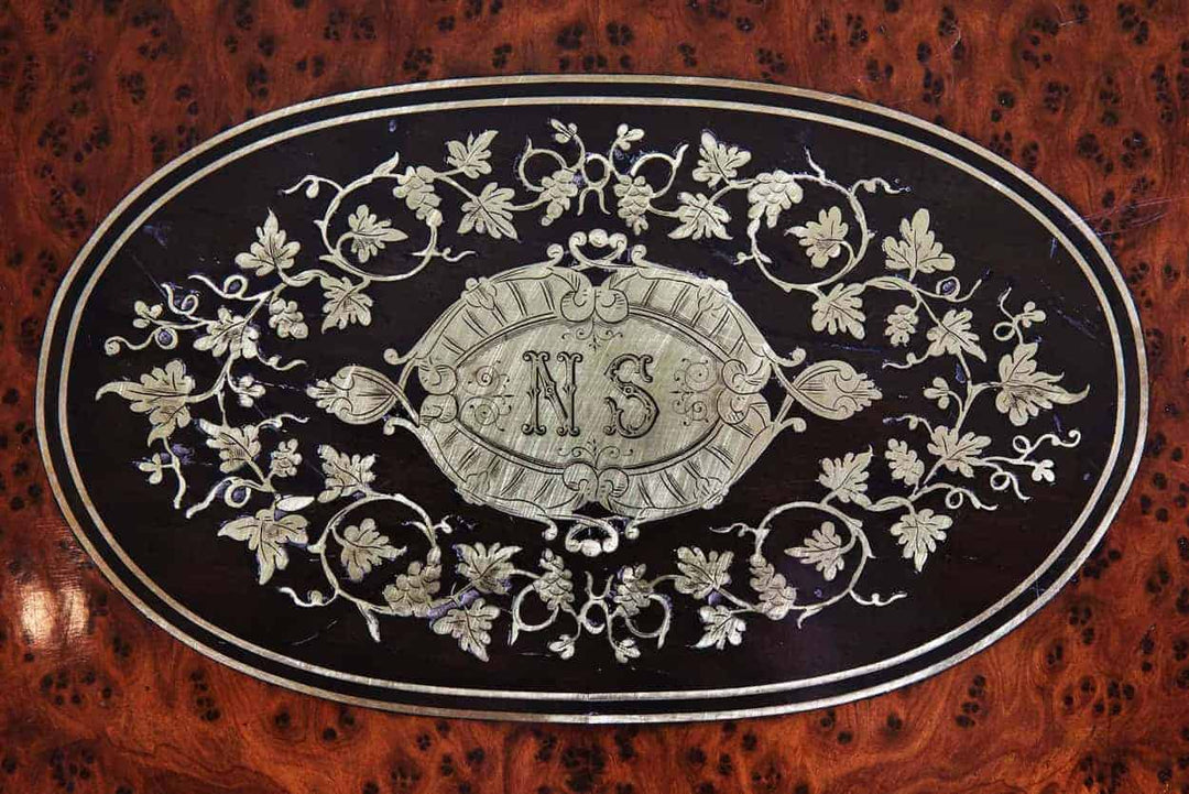 Paul Sormani Exotic Amboyna Work Table showing intricate floral inlay on hinged lid in ebony and brass details.