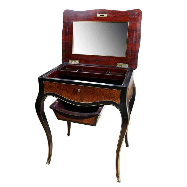 Paul Sormani Exotic Amboyna Work Table with hinged mirrored lid, slide basket, ebony and brass details, circa 1870.