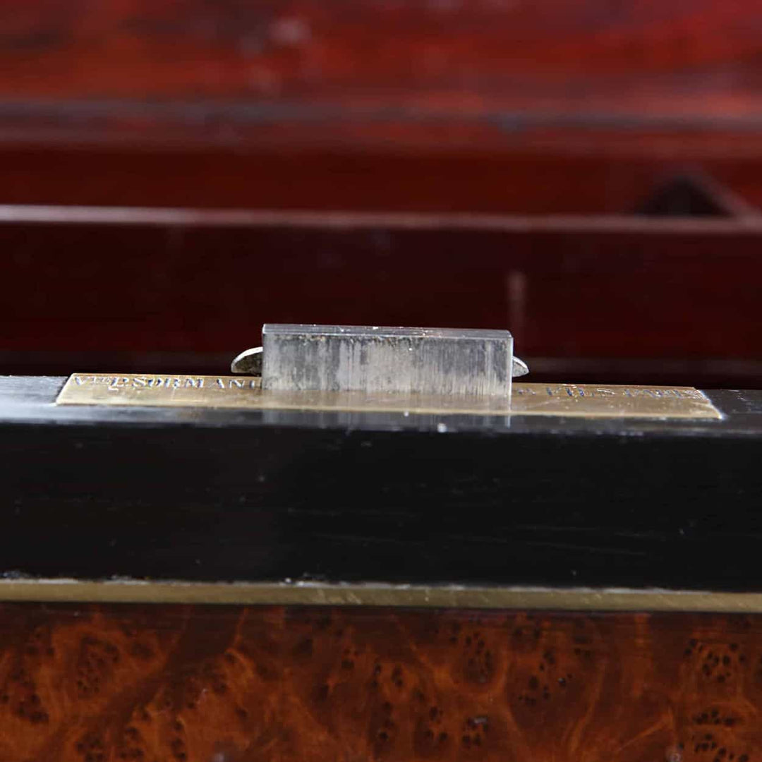 Close-up of the brass lock detail on the Paul Sormani Exotic Amboyna Work Table circa 1870.