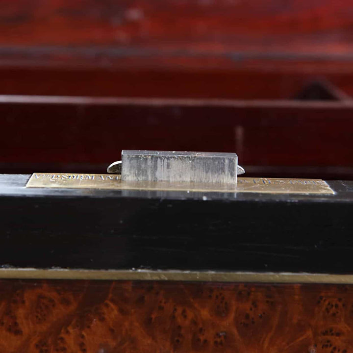 Close-up of the brass lock detail on the Paul Sormani Exotic Amboyna Work Table circa 1870.