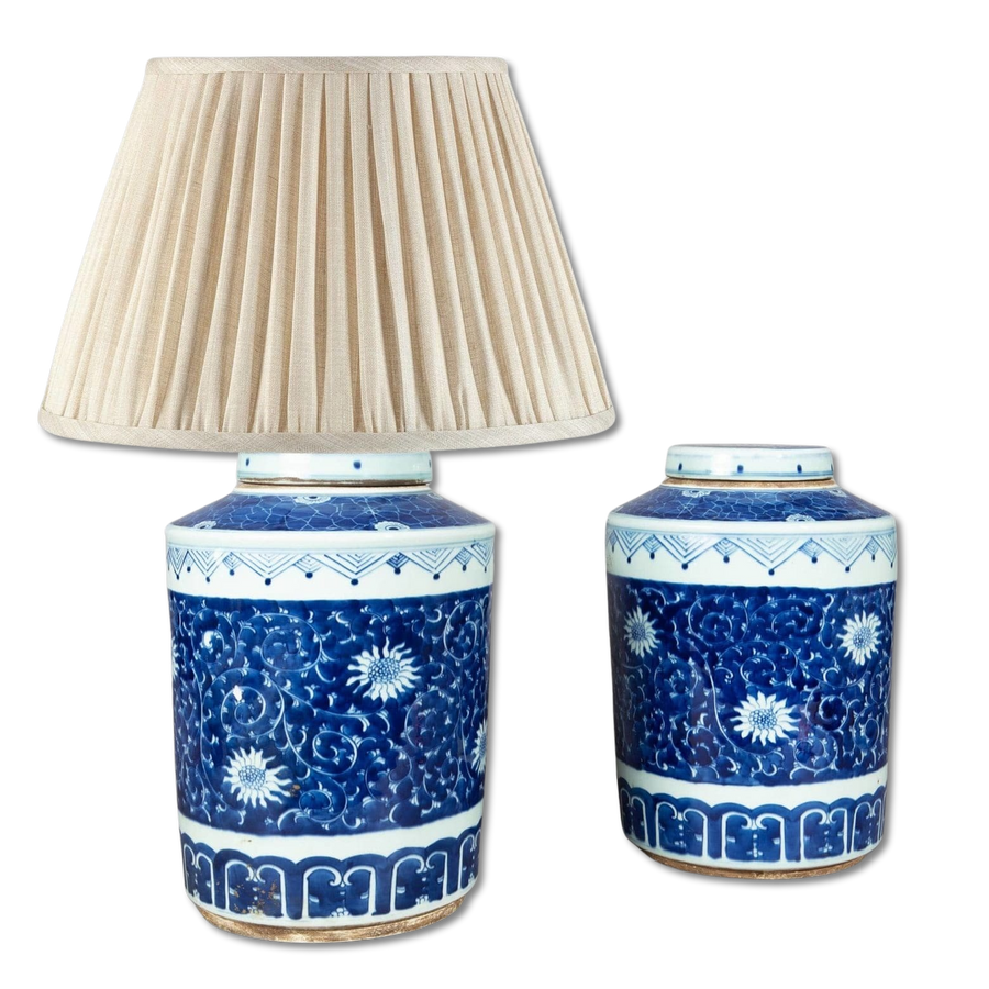 Pair of Chinese Blue and White Porcelain Ginger Jars as Lamps with floral patterns and one fitted with a beige lampshade.