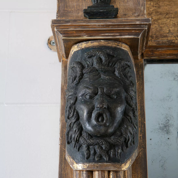 Federal Parcel Gilt Overmantle Mirror with carved gorgon head and aged original mirror plate in a classical Greek style frame.