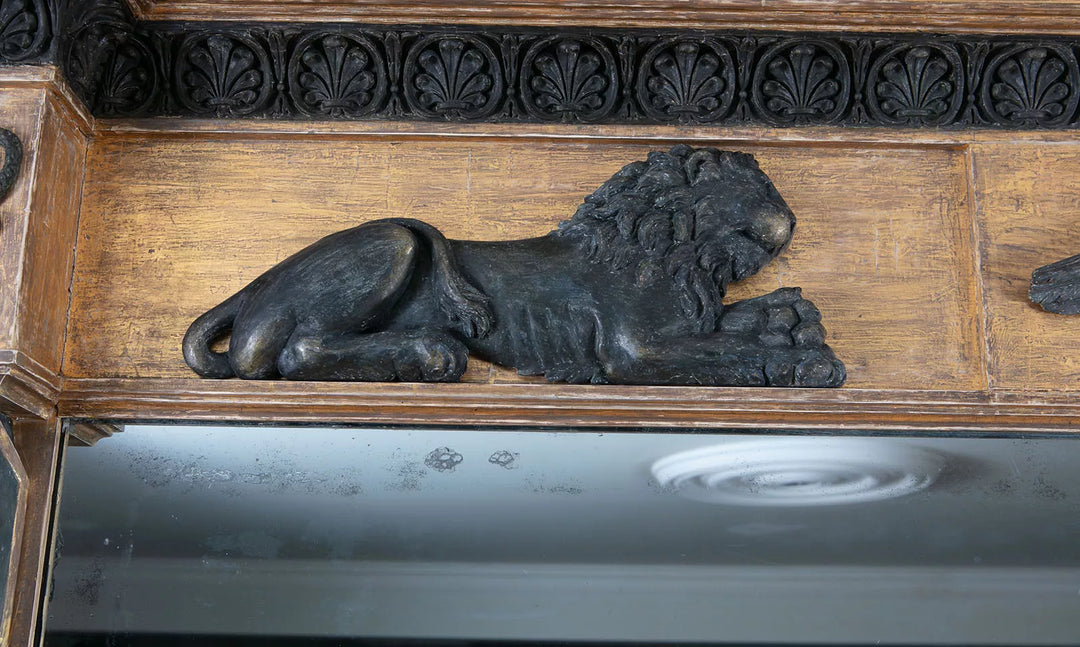 Federal Parcel Gilt Overmantle Mirror with ebonised lion detail and classical Greek decorative motifs.