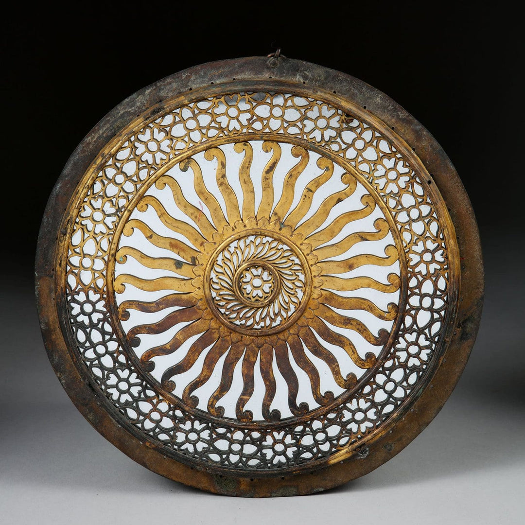 Antique gilt copper mirrored chakra with intricate pierced floral design by Collection EE20 circa 1880 India