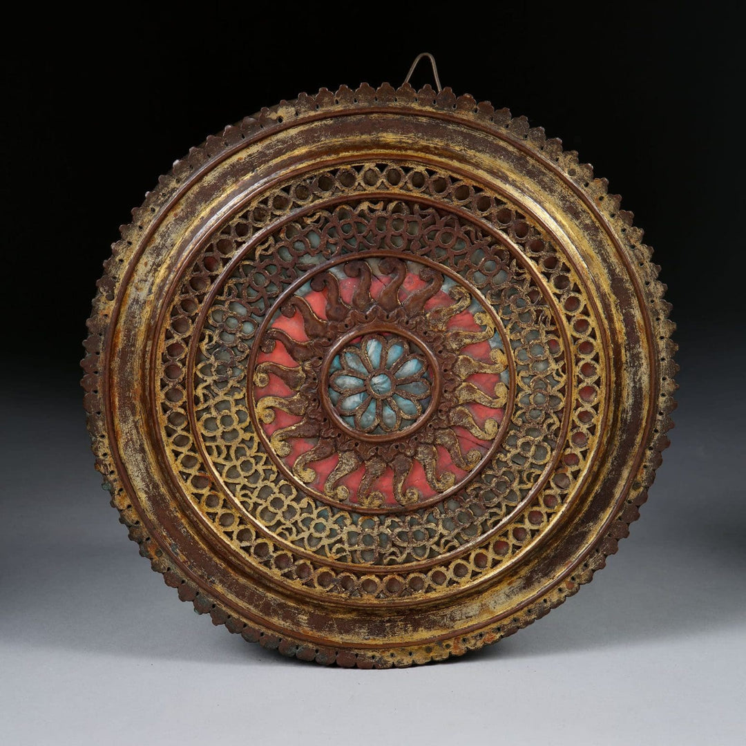 Group of nine pierced gilt copper mirrored Chakras with intricate patterns by Collection EE20, circa 1880, 26cm diameter