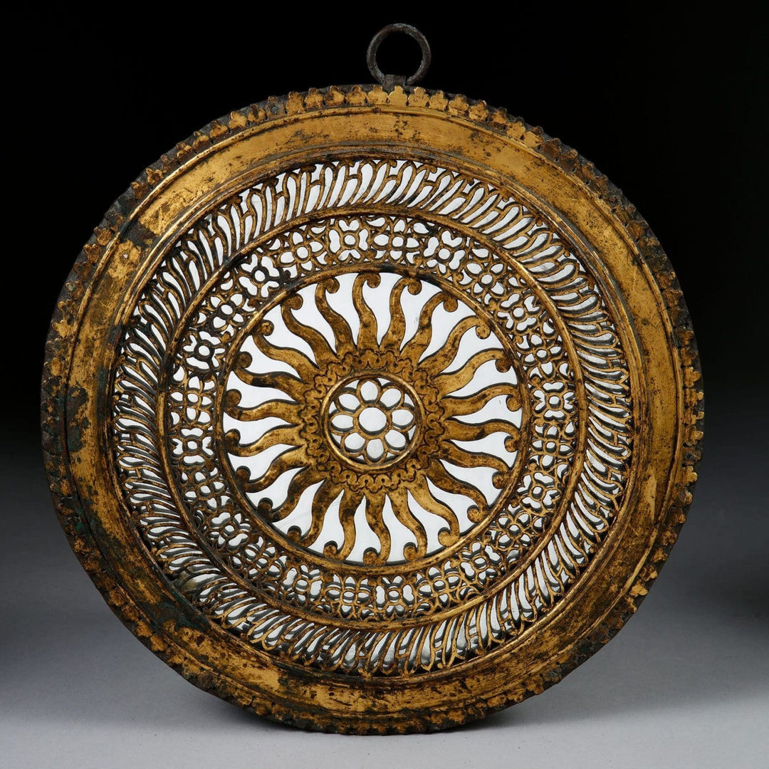 Pierced gilt copper mirrored chakra with ornate sun and floral design, approximately 26cm, Collection EE20 craftsmanship