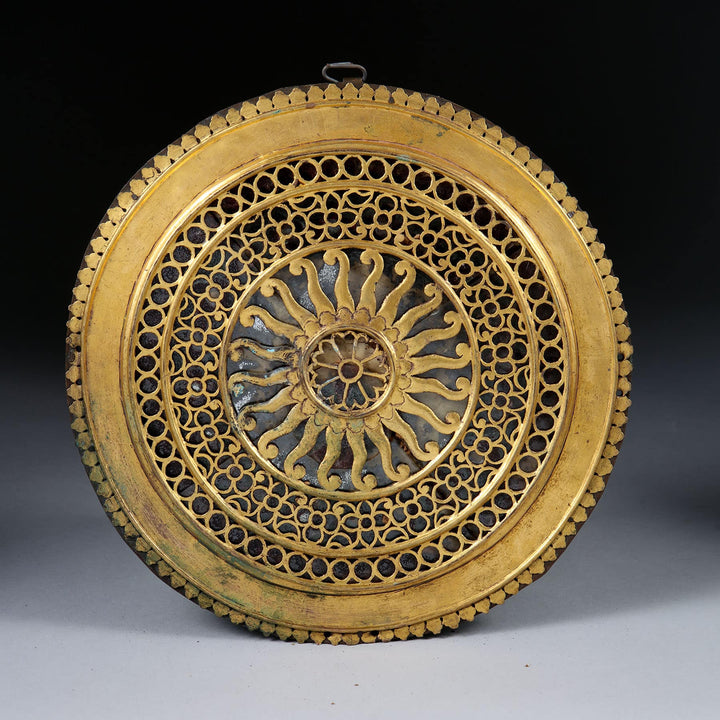 Pierced gilt copper mirrored chakra with intricate design, circa 26cm, from Collection EE20.