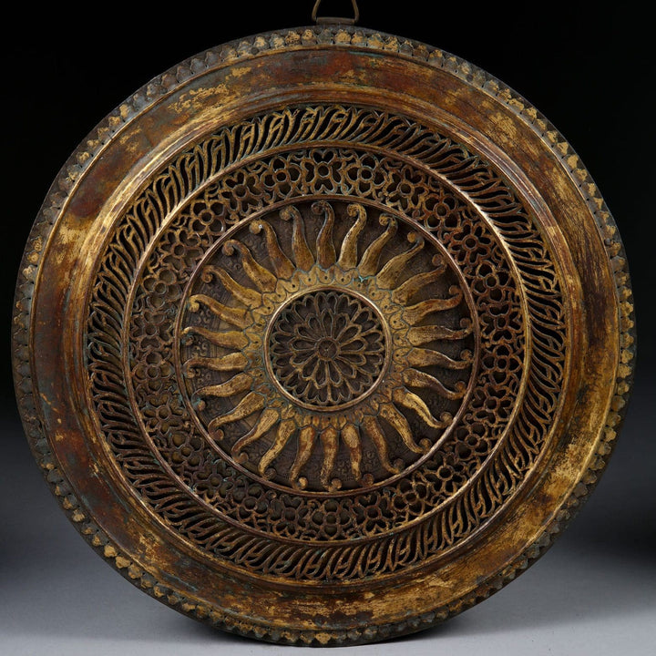 Antique pierced gilt copper mirrored Chakra with intricate design from Collection EE20 measuring approximately 26cm in diameter