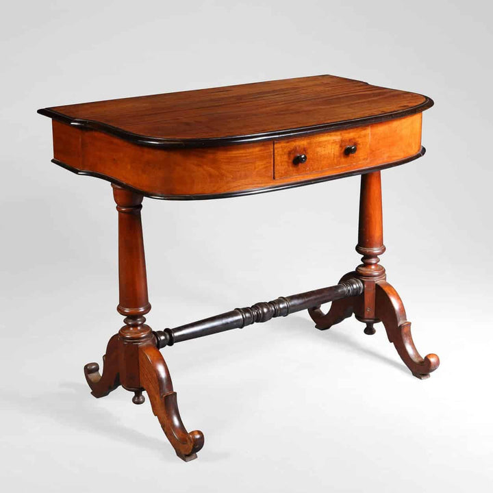 Indo Dutch Solid Satinwood and ebony side table with shaped top, ebony mouldings, turned supports, and stretcher circa 1850