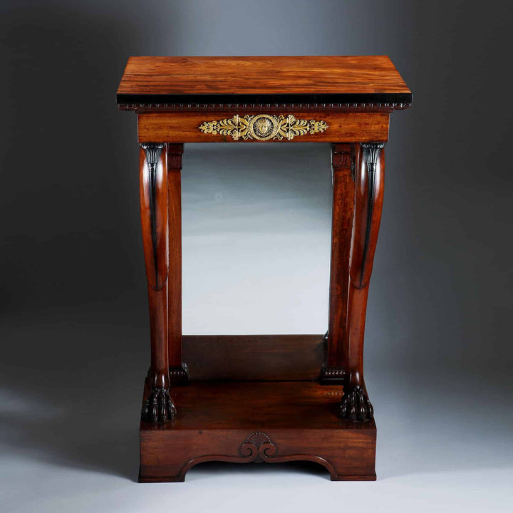 Pair of Regency Pier Console Tables in mahogany with gilt bronze mounts and mirror backs, early 19th century design.